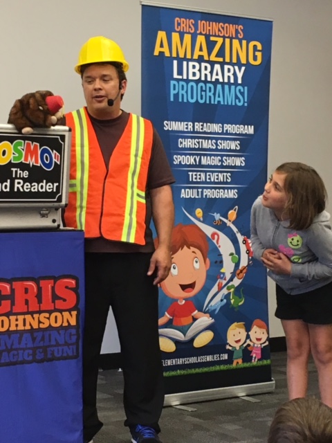 library show magician Cris Johnson with a puppet