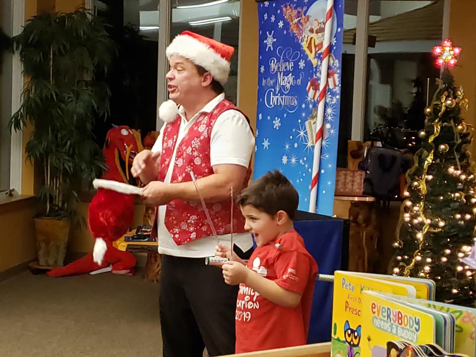School assembly performer Cris Johnson at a Christmas magic show